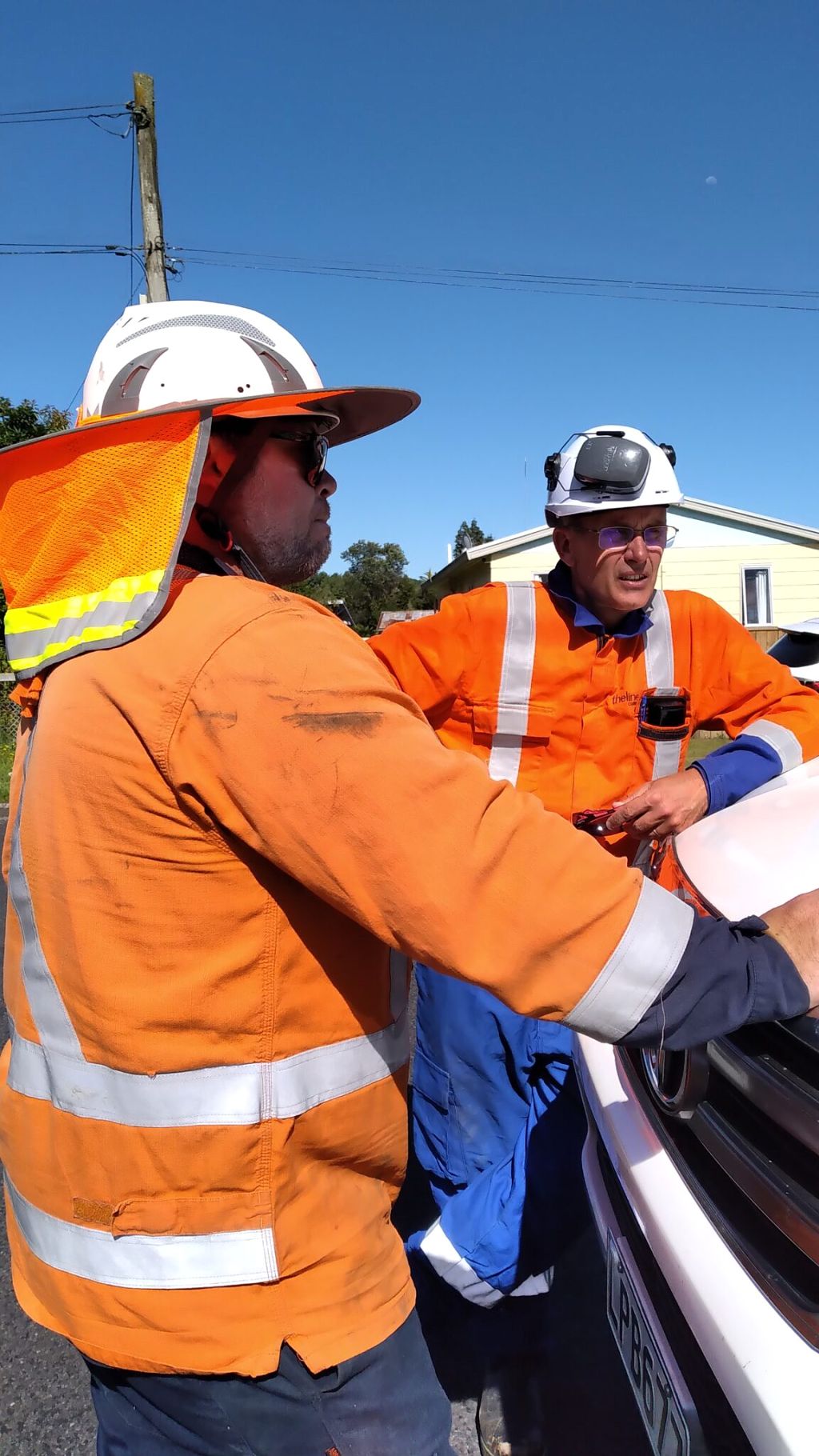 Omexom foreman Donovan Bezuidenhoud (left) and TLC chief executive Mike Fox discuss the ongoing works in Taumarunui.